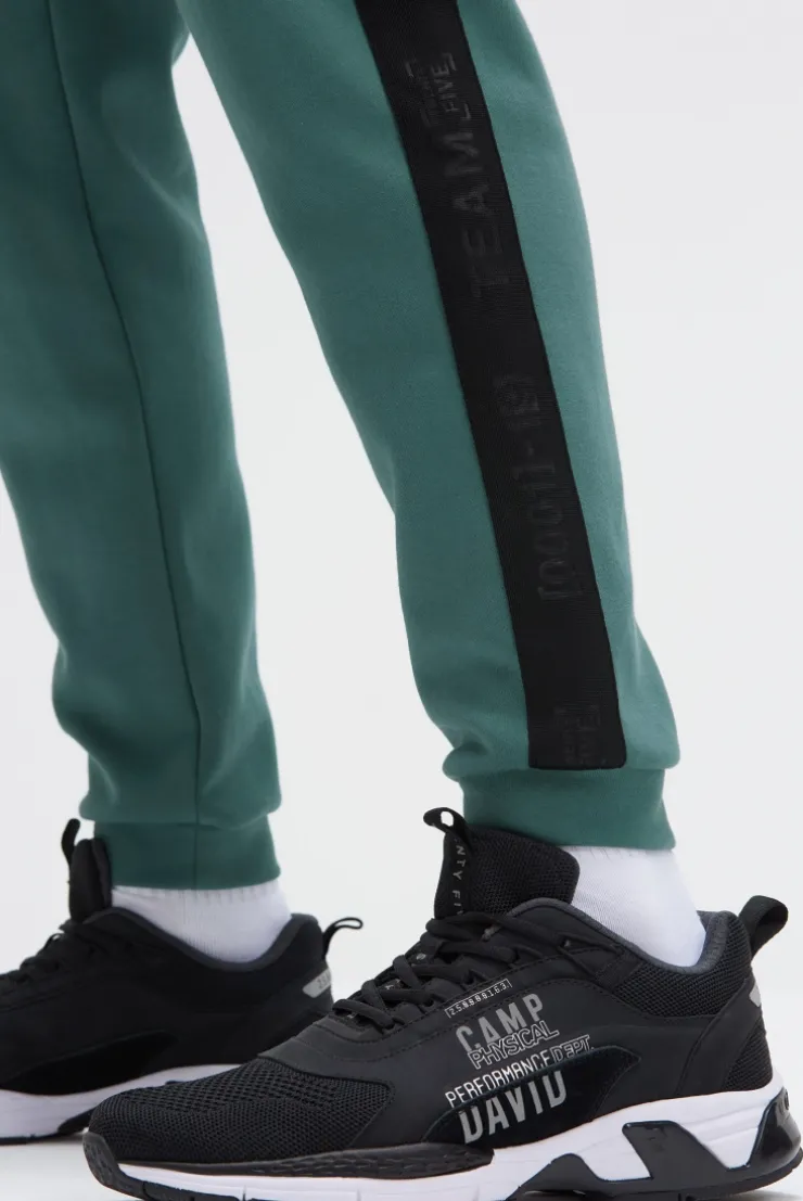 Jogginghose aus Interlock mit Seitentapes petrol green