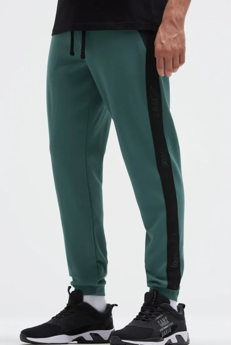 Jogginghose aus Interlock mit Seitentapes petrol green