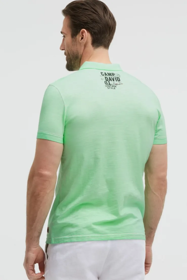 Kurzarmpolo Oil Dyed mit Logo Print neon green