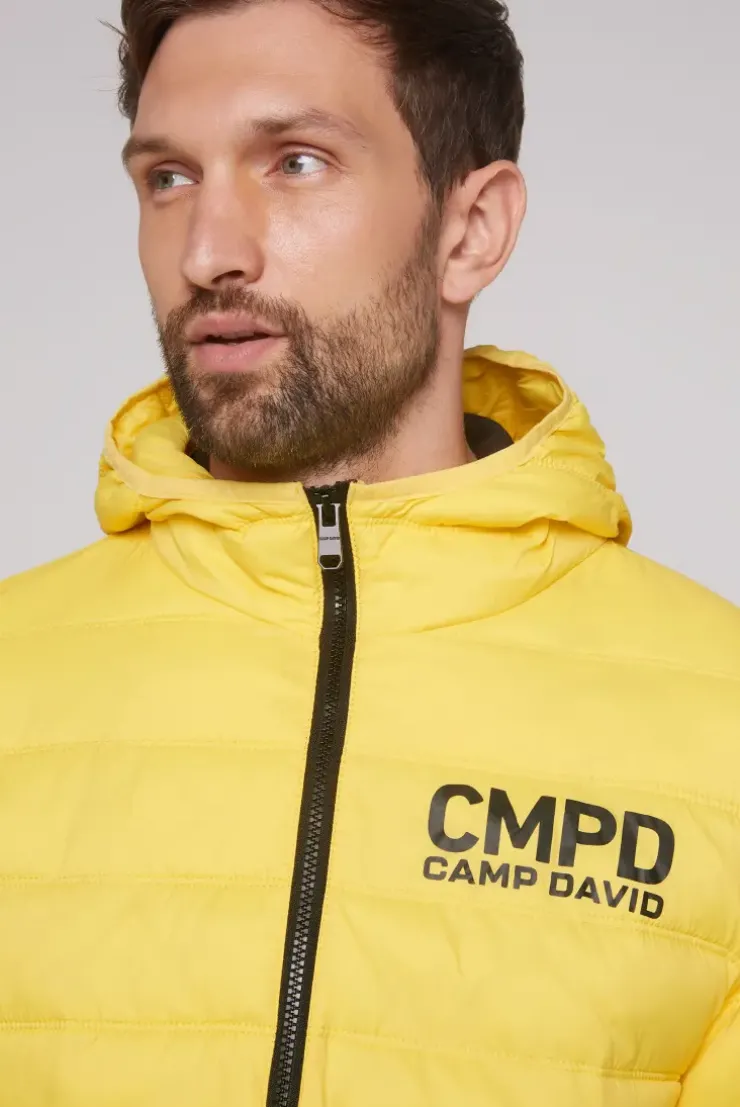 Leichte Steppjacke mit Kapuze industrial yellow