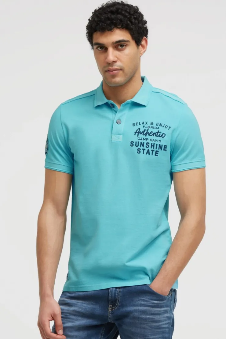 Pikee-Polo Kurzarm mit Rücken-Stickerei aqua