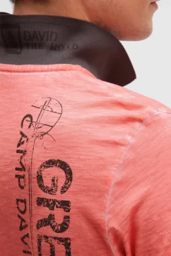 Poloshirt mit Vintage Prints wild salmon