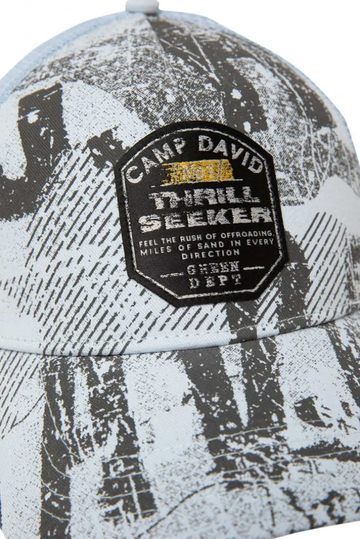 Trucker Cap mit All Over Print und Patch silver blue