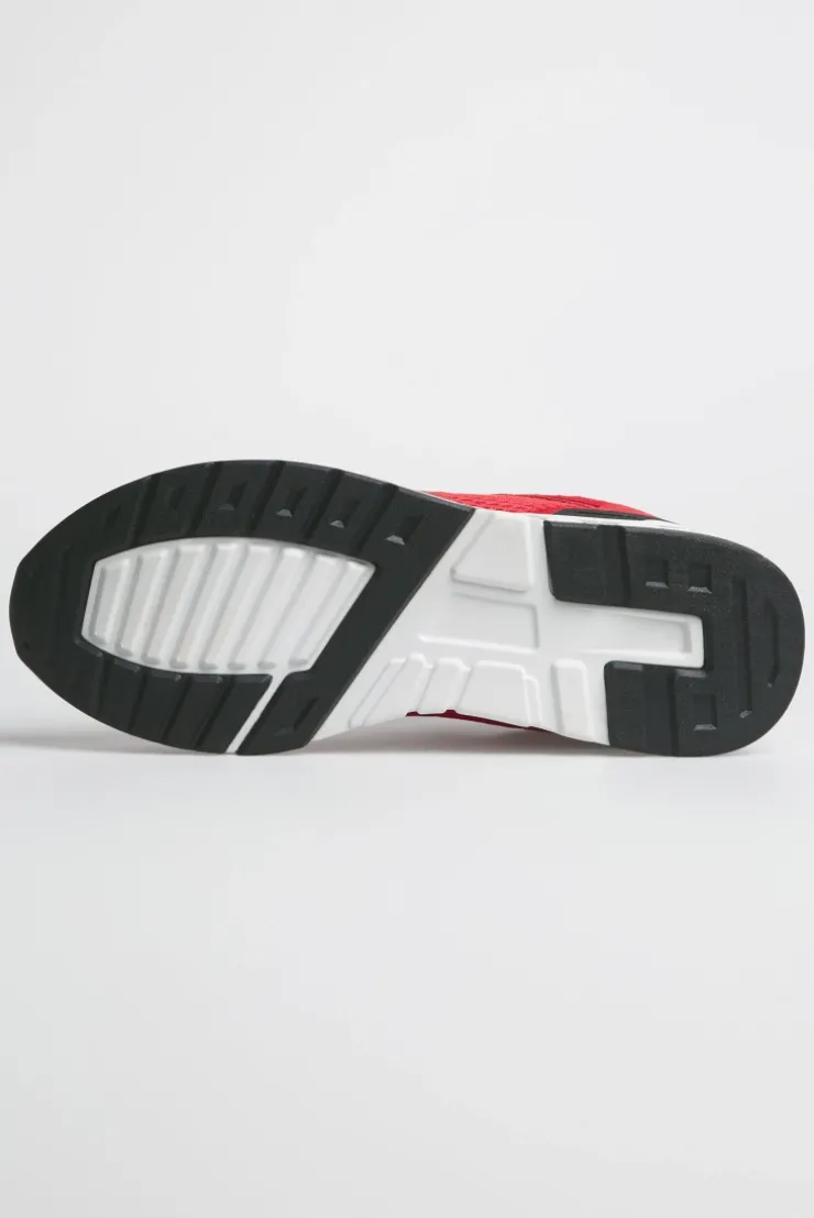 Urban Sneaker im Materialmix mit Logo-Sohle energy red